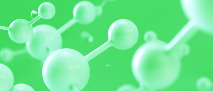 Hellgrüne Molekülstrukturen auf einem grünen Hintergrund